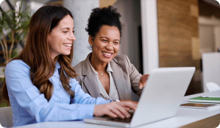 Smiling women in a business setting