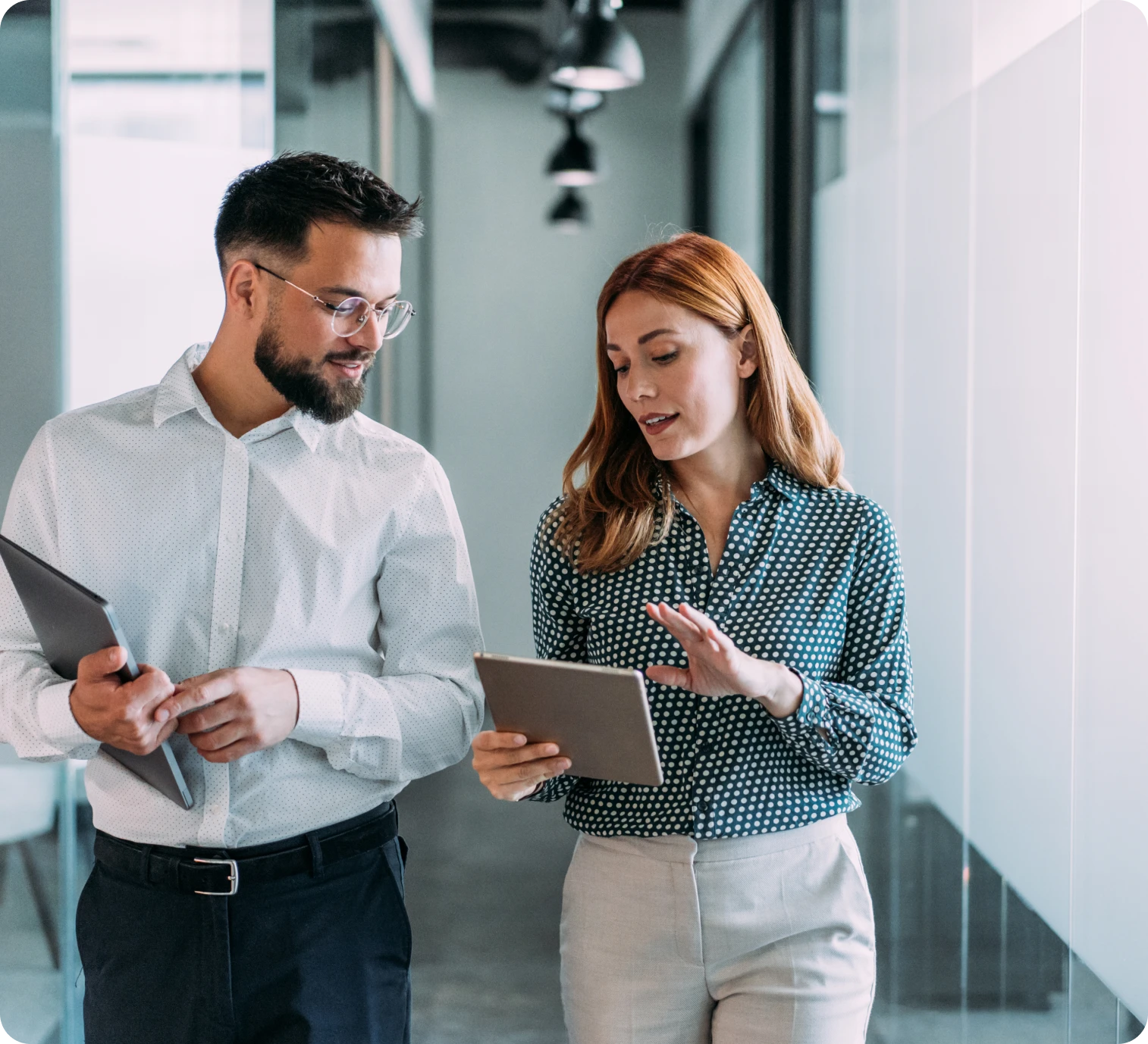 Business meeting in modern hallway