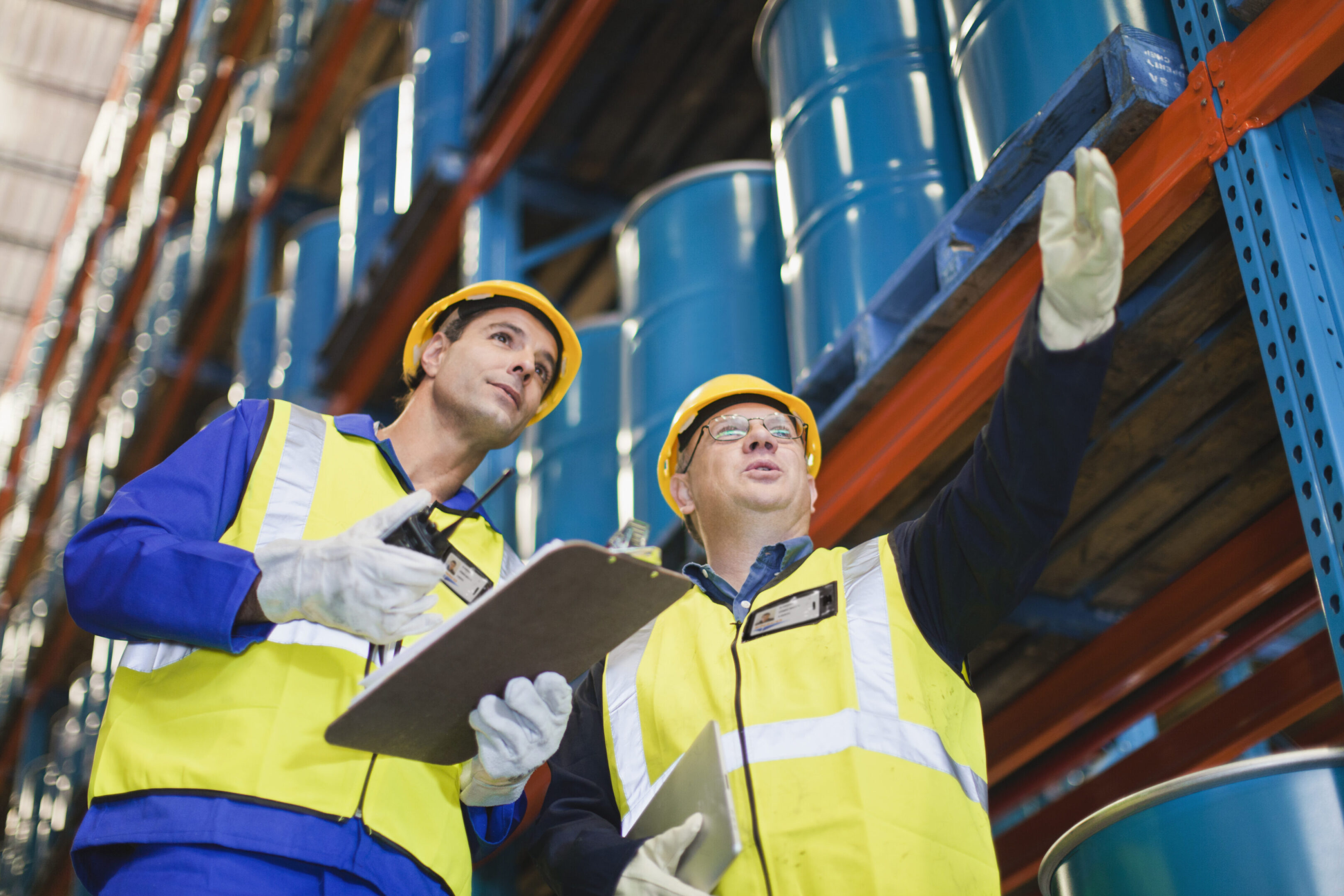 Workers talking in warehouse