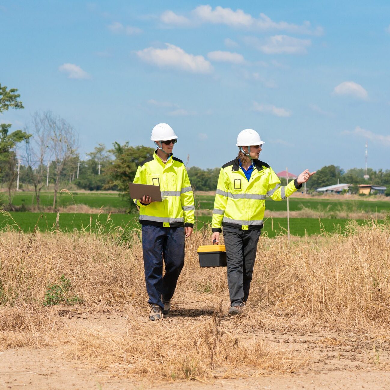 Caucasian electrician, technician, or engineer employed at a solar farm or sungrid plant that promotes clean, renewable energy,sustainable energy concept.